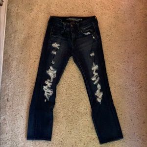 Black washed American Eagle Jeans! Tears!